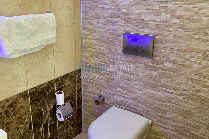 Purchase  Two-storey villa in Kargicak, furnished, with private garage and swimming pool  25 