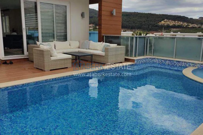 Purchase  Two-storey villa in Kargicak, furnished, with private garage and swimming pool  28 