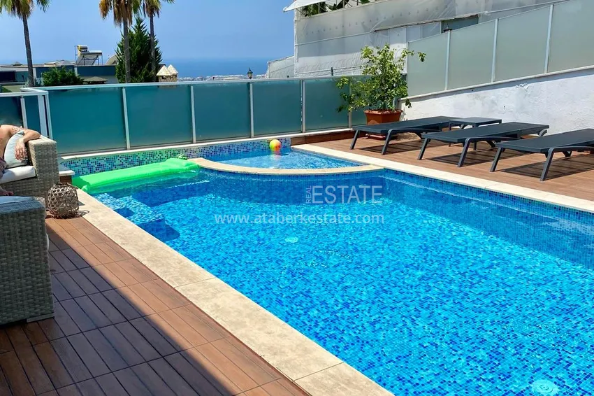 Purchase  Two-storey villa in Kargicak, furnished, with private garage and swimming pool  29 