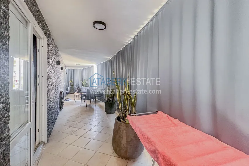 Purchase Two-bedroom apartment with new furniture and a glazed balcony in Mahmutlar 26 