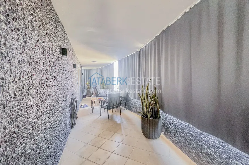 Purchase Two-bedroom apartment with new furniture and a glazed balcony in Mahmutlar 27 