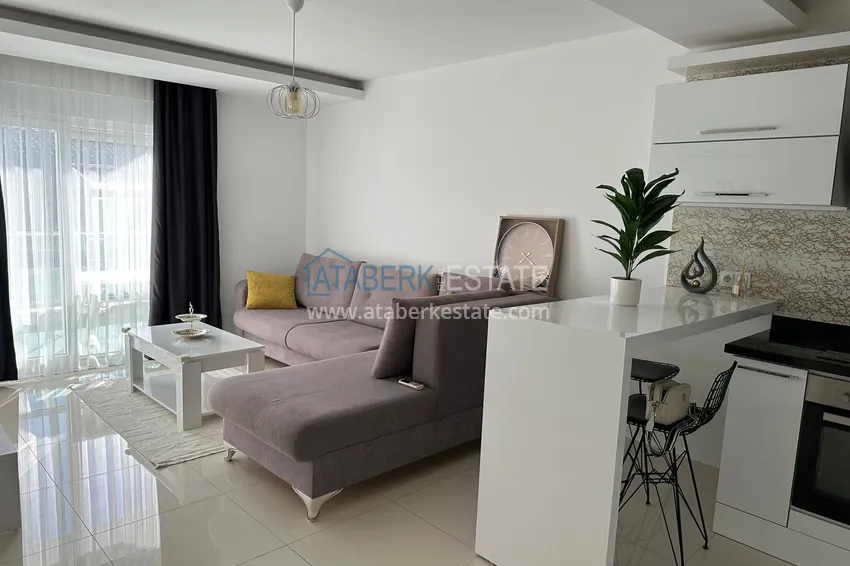 Purchase  1+1 furnished apartment with mountain views, Alanya center Cleopatra beach area 2 