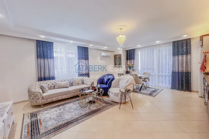 Purchase Two-bedroom apartment with new furniture and a glazed balcony in Mahmutlar 3 