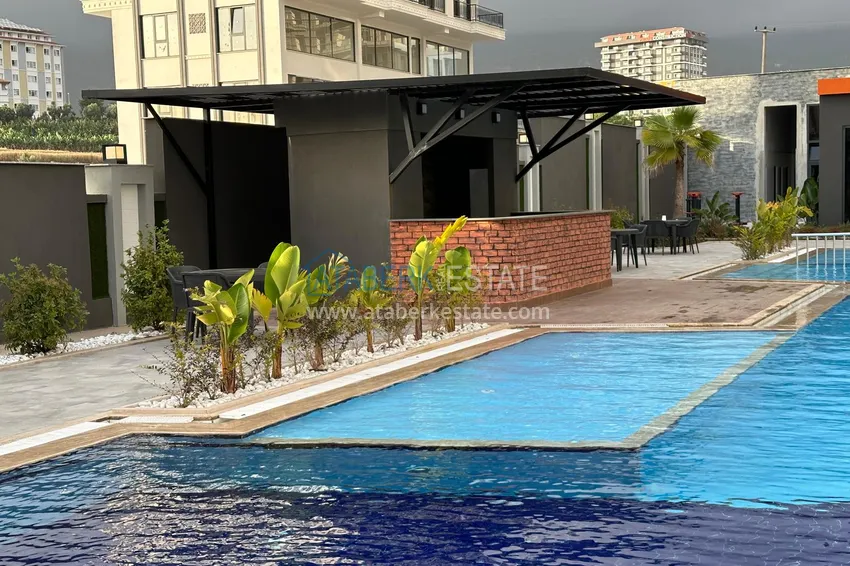 Two-bedroom furnished apartment for long-term rent in the center of Mahmutlar, Saturday market area No. 112 3 