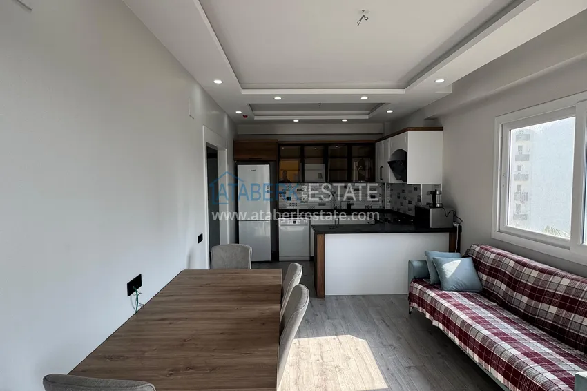 Purchase Two-bedroom apartment with furniture and a glazed balcony in Mersin - Tomyuk 5
