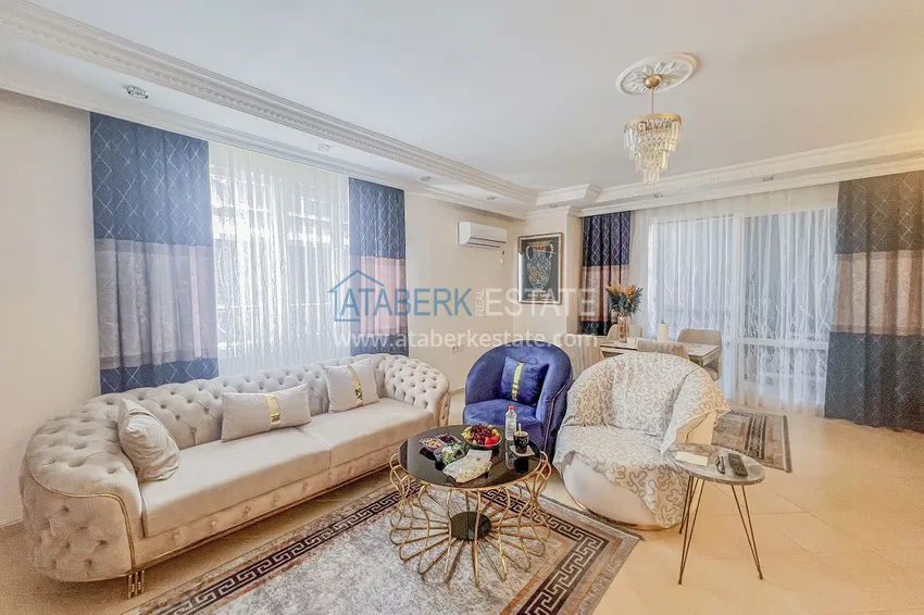 Purchase Two-bedroom apartment with new furniture and a glazed balcony in Mahmutlar 4 