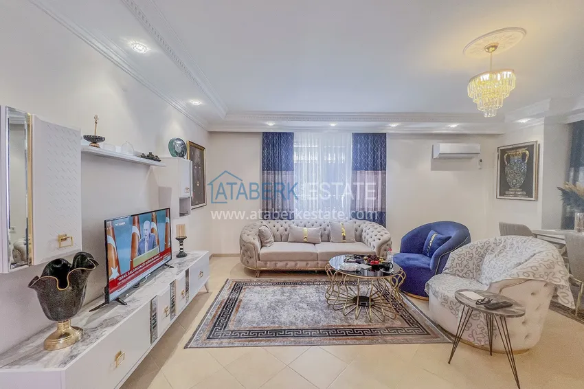Purchase Two-bedroom apartment with new furniture and a glazed balcony in Mahmutlar 5 