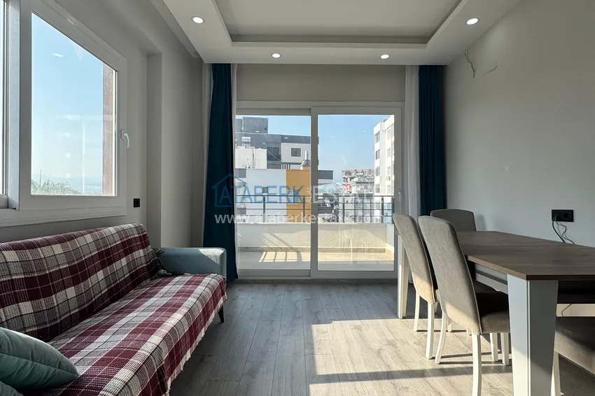 Purchase Two-bedroom apartment with furniture and a glazed balcony in Mersin - Tomyuk 7