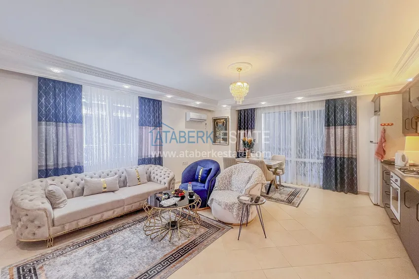 Purchase Two-bedroom apartment with new furniture and a glazed balcony in Mahmutlar 6 