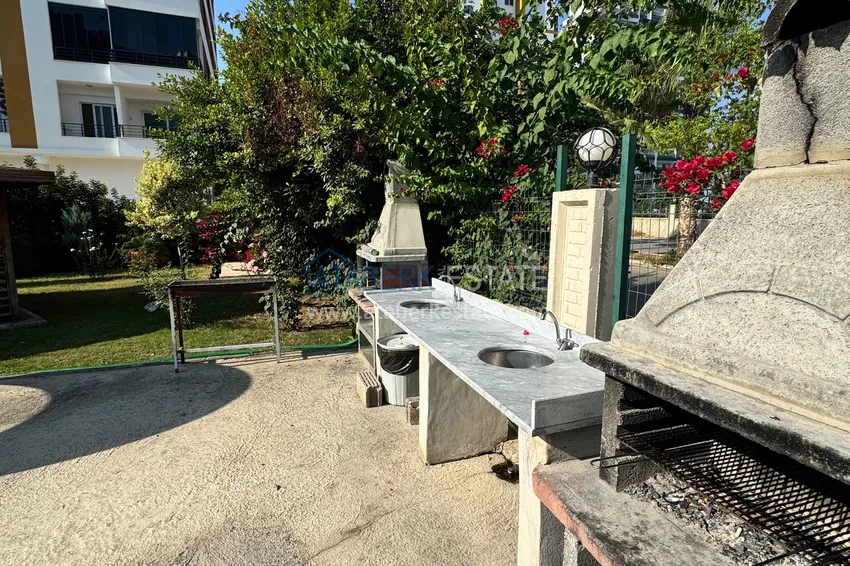 Two-bedroom apartment with furniture and a glazed balcony in Mersin - Tomyuk 6