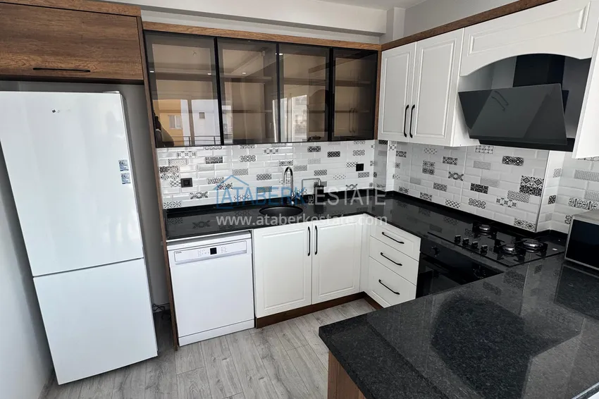 Purchase Two-bedroom apartment with furniture and a glazed balcony in Mersin - Tomyuk 8