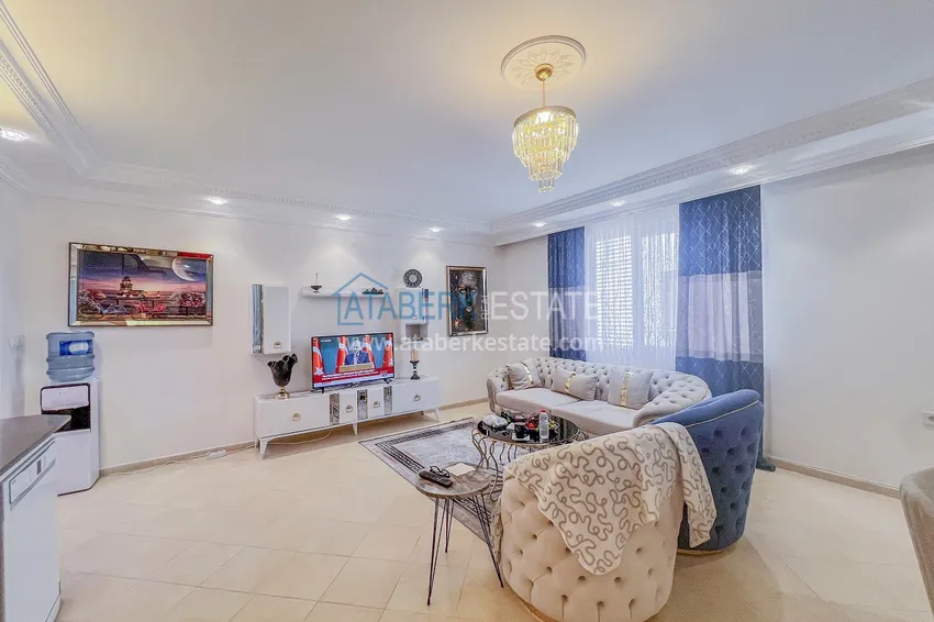 Purchase Two-bedroom apartment with new furniture and a glazed balcony in Mahmutlar 7 