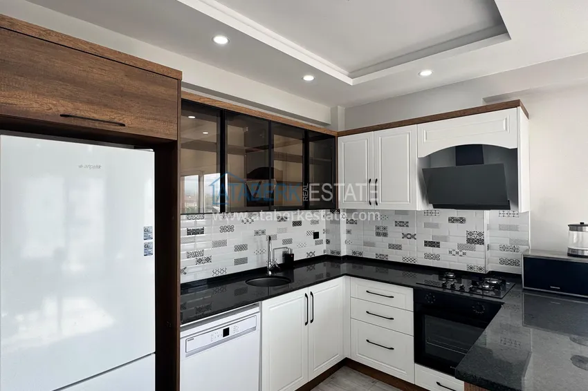 Purchase Two-bedroom apartment with furniture and a glazed balcony in Mersin - Tomyuk 9