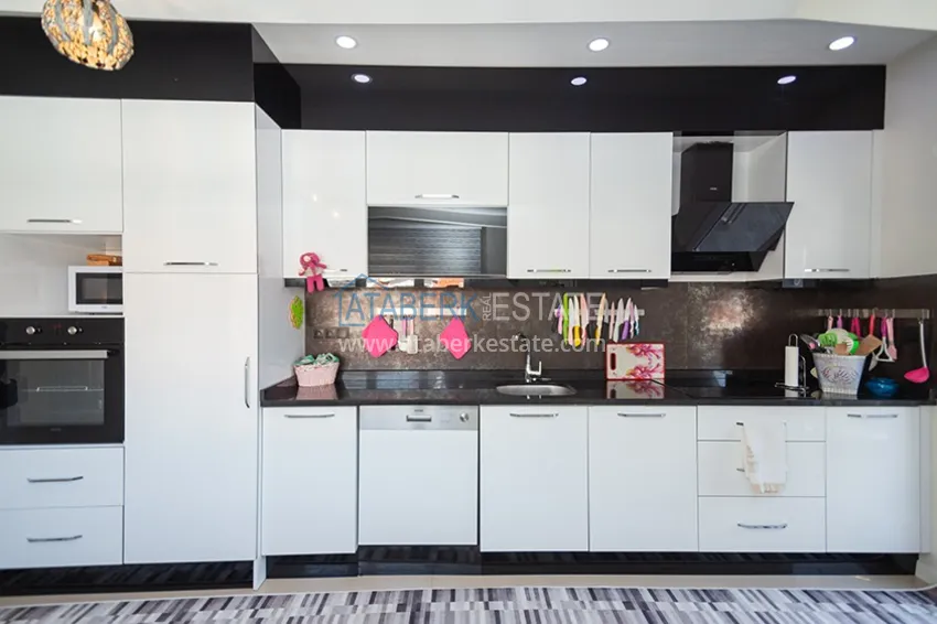 Purchase  Real estate for a residence permit. Furnished apartment with separate kitchen - Alanya city center, Cleopatra district 8 