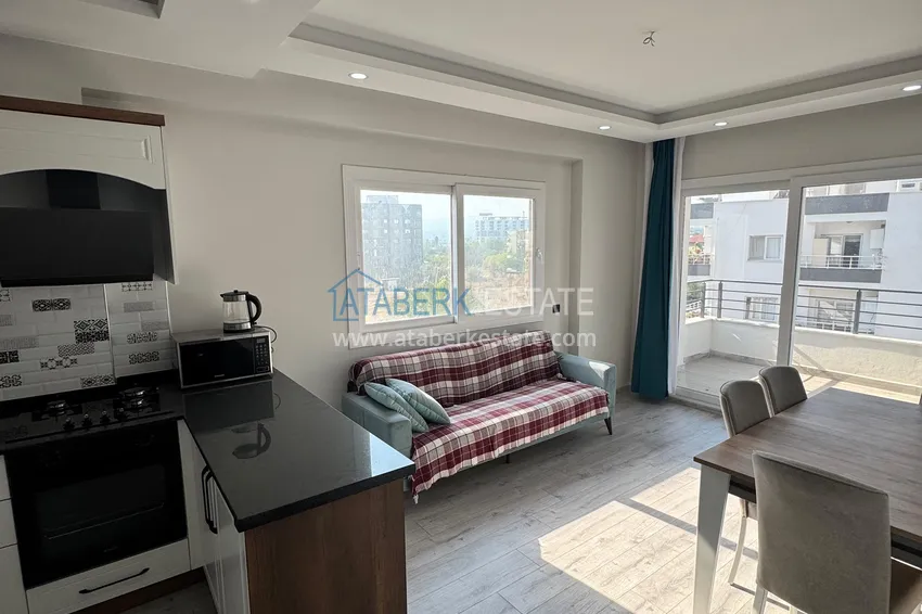 Purchase Two-bedroom apartment with furniture and a glazed balcony in Mersin - Tomyuk 10