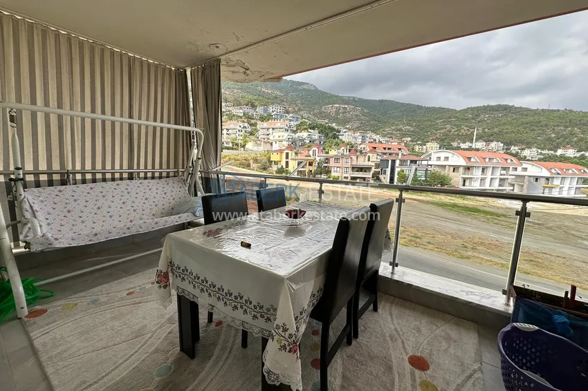 Purchase  Apartment in the center of Alanya with separate kitchen furniture and mountain views  9 