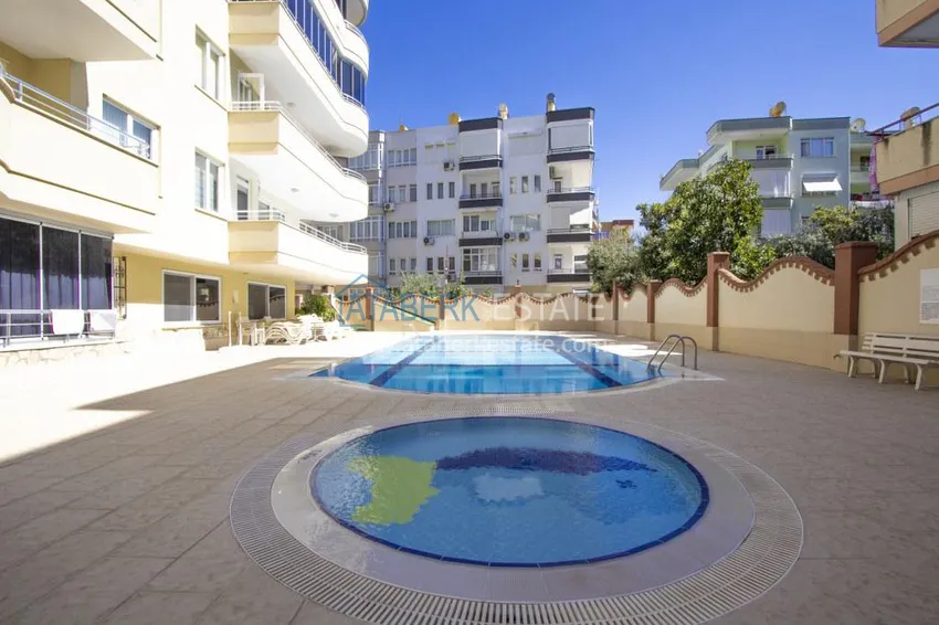 Turnkey 2+1 apartment with glazed cormorants and sea views in the center of Alanya 10