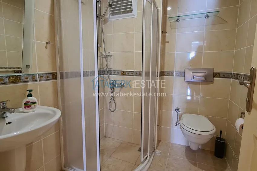 Purchase  2+1 apartment with furniture and a glazed balcony just 300 meters from the sea, Oba district - Alanya 12 