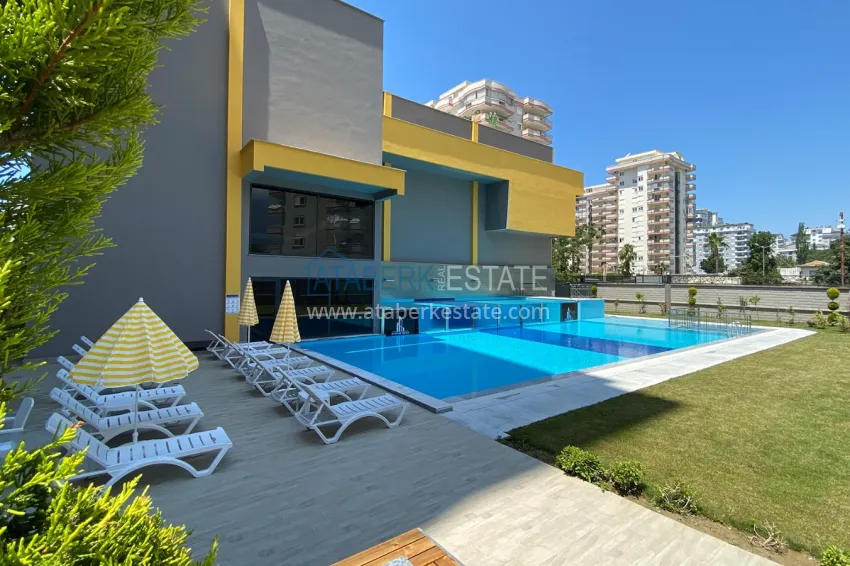 Three-room apartment in Mahmutlar, with a separate kitchen in a modern complex 9 