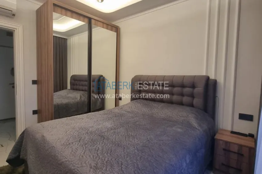 Purchase  Furnished three-room apartment in a prestigious area of Alanya, Oba 12 