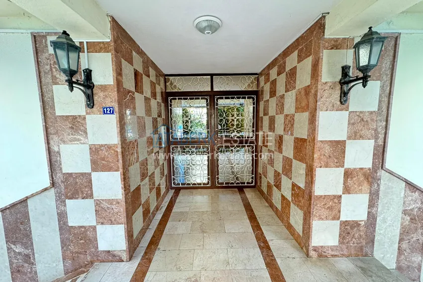 Apartment in Mahmutlar partially furnished with a glazed balcony and sea view 12 