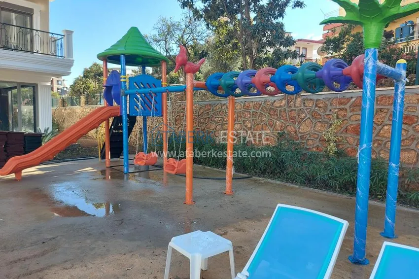 Furnished three-room apartment in a prestigious area of Alanya, Oba 11 