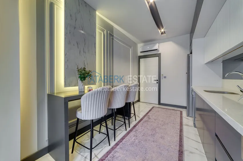 Purchase  An apartment with a designer interior and a separate kitchen in the center of Mahmutlar - Saturday Market District 12 