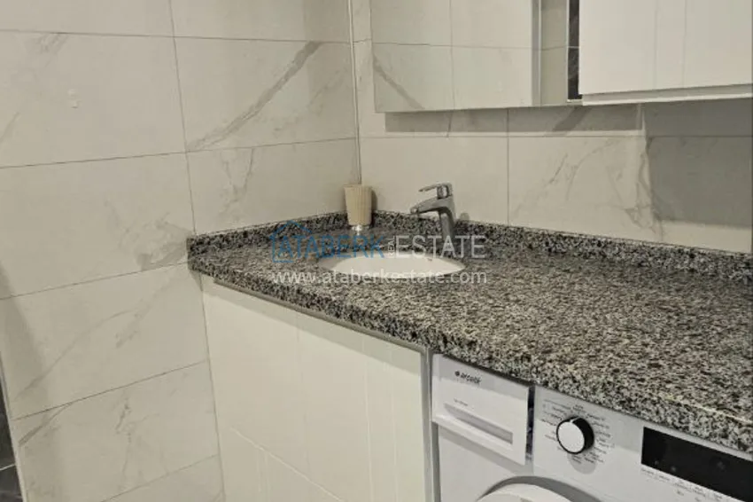 Purchase  Furnished 1+1 apartment 300 meters from the sea, Mahmutlar district — Alanya 12 