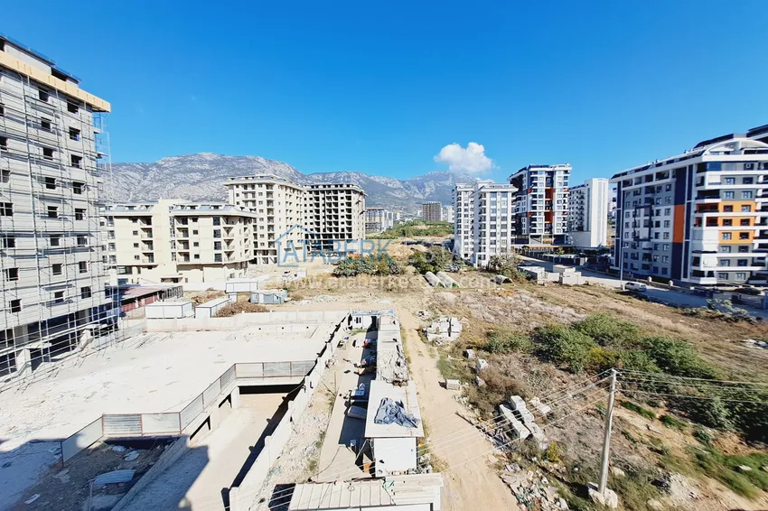 Purchase New buildings in Alanya! One bedroom apartment with mountain views directly from the owner, Mahmutlar district 13