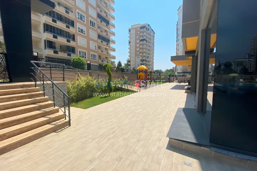 Three-room apartment in Mahmutlar, with a separate kitchen in a modern complex 10 