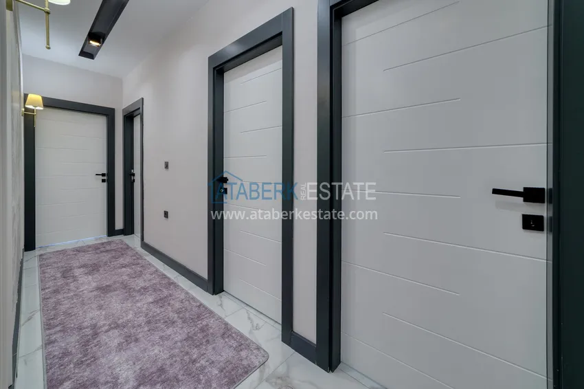 Purchase  An apartment with a designer interior and a separate kitchen in the center of Mahmutlar - Saturday Market District 14 