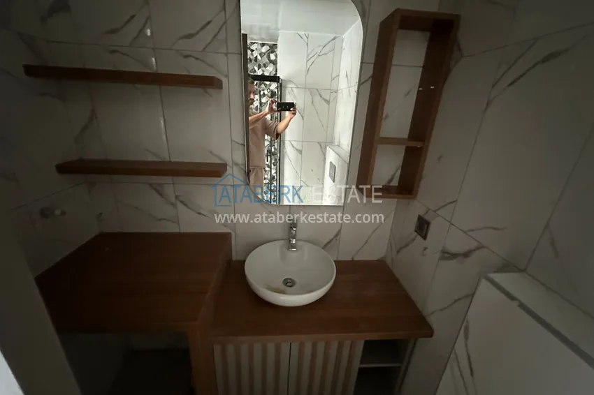 Purchase  1+1 apartment with sea view in Mersin — Arpachbakhshish, in a complex under completion 13 