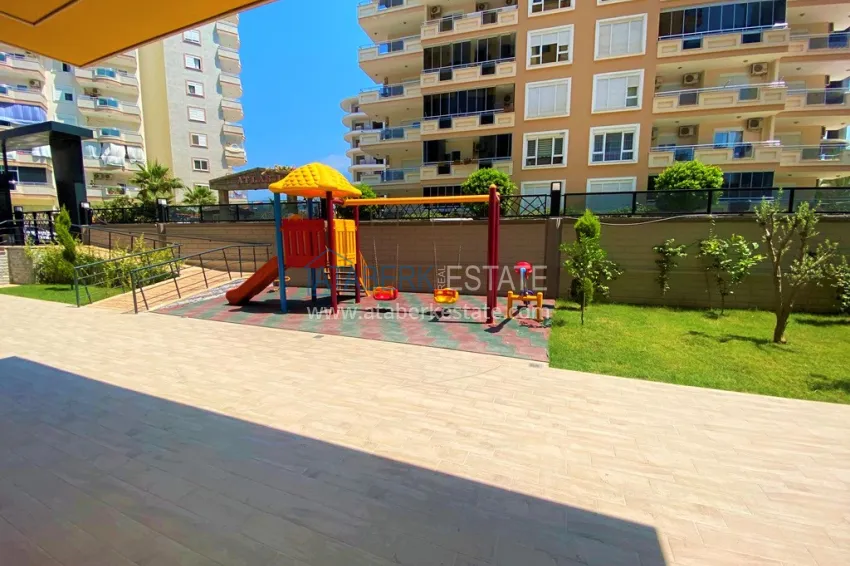 Three-room apartment in Mahmutlar, with a separate kitchen in a modern complex 11 