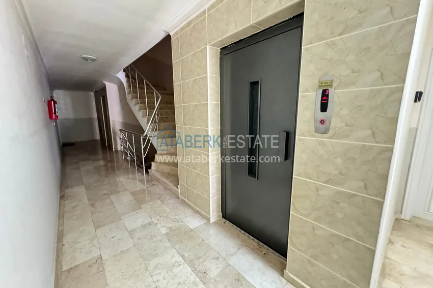 Apartment in Mahmutlar partially furnished with a glazed balcony and sea view 14 