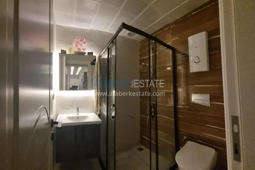Purchase  Furnished three-room apartment in a prestigious area of Alanya, Oba 15 