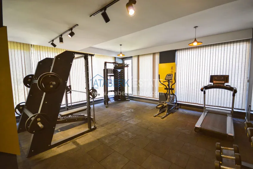 Furnished three-room apartment in a prestigious area of Alanya, Oba 15 