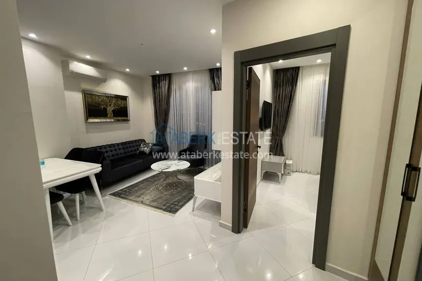 Purchase  Furnished one-bedroom apartment in a complex with hotel infrastructure, Mahmutlar district — Alanya  1 