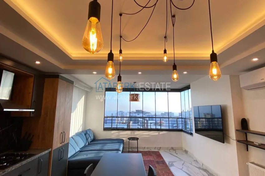 Purchase Furnished two-bedroom apartment with panoramic sea views in Soli district, Mersin 1 