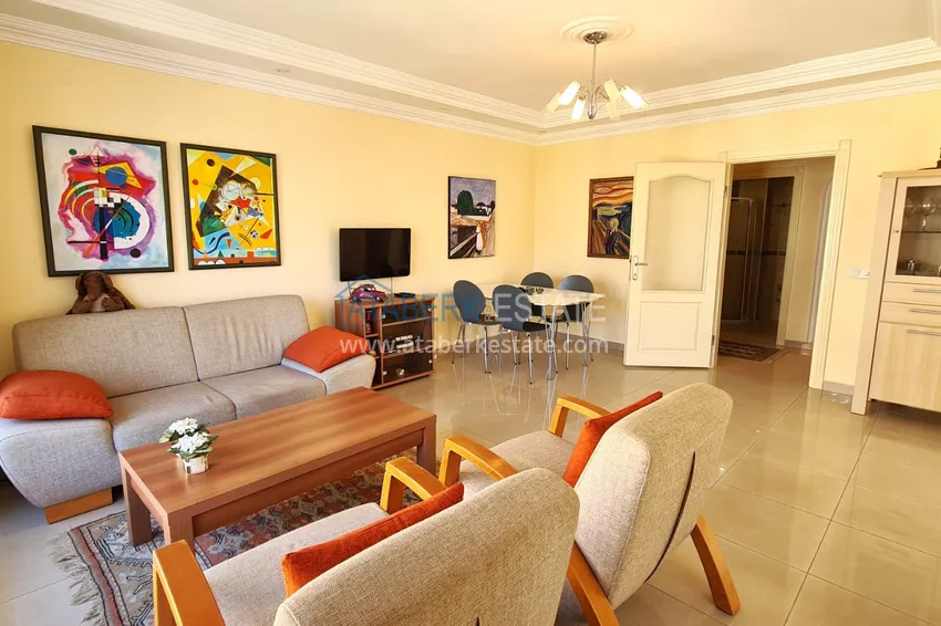 Purchase  2+1 apartment with furniture and a glazed balcony just 300 meters from the sea, Oba district - Alanya 1 