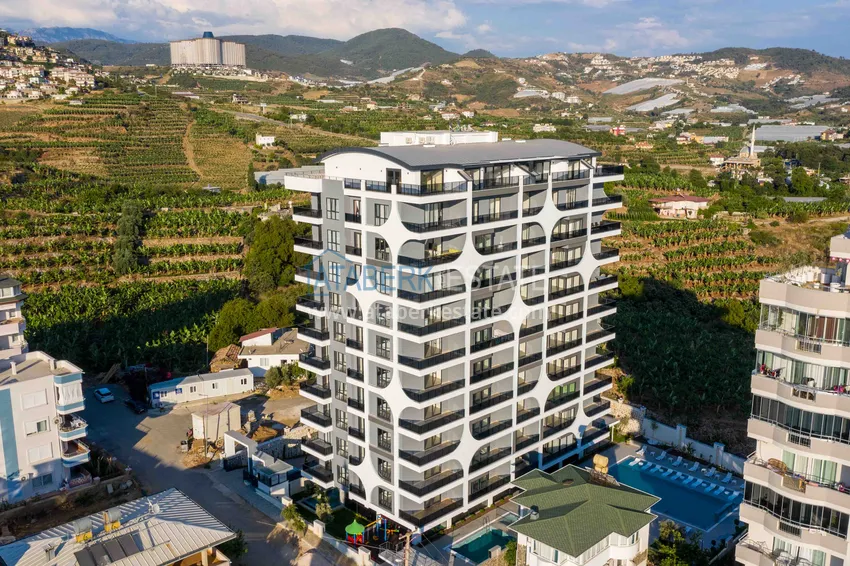 Three-room apartment with furniture and mountain views, Mahmutlar district — Alanya 2 