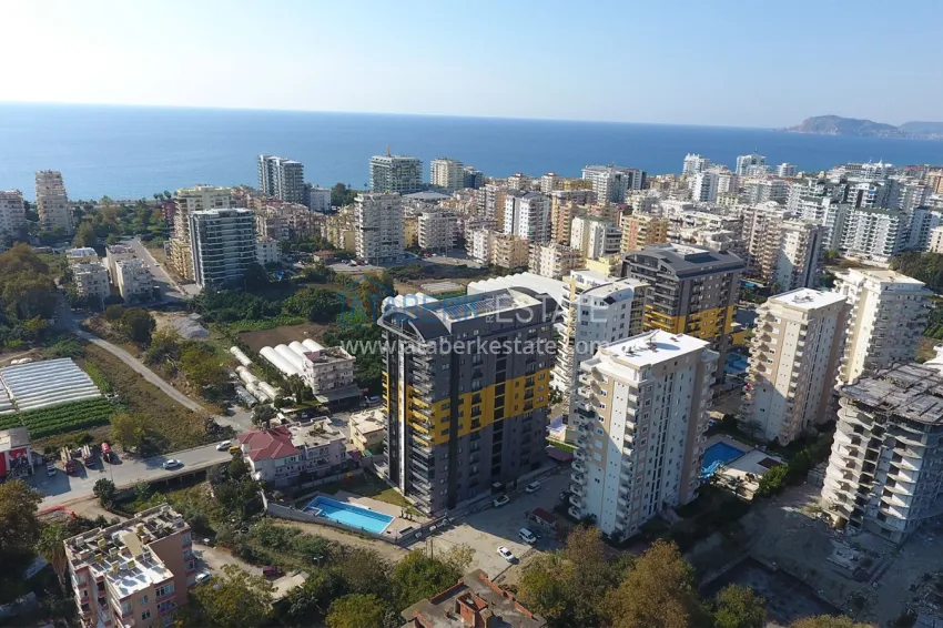 Three-room apartment in Mahmutlar, with a separate kitchen in a modern complex 1 