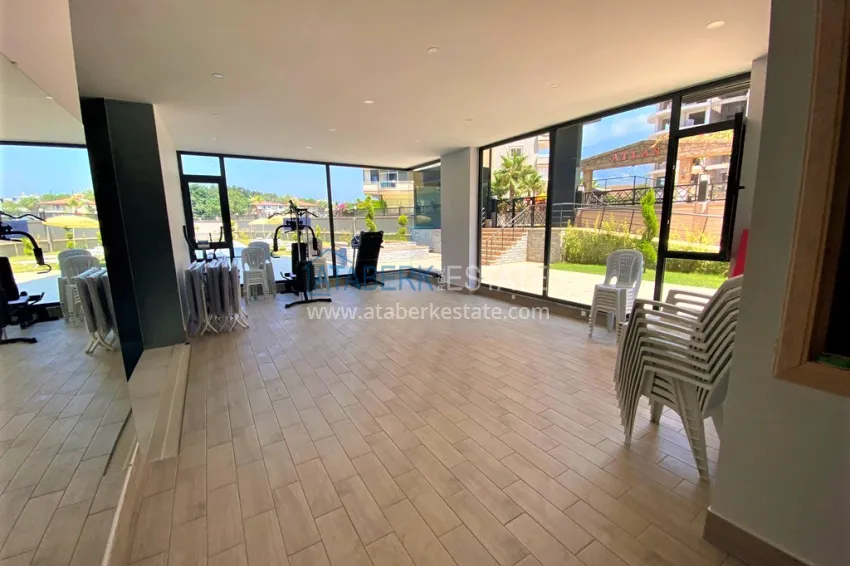 Three-room apartment in Mahmutlar, with a separate kitchen in a modern complex 19 