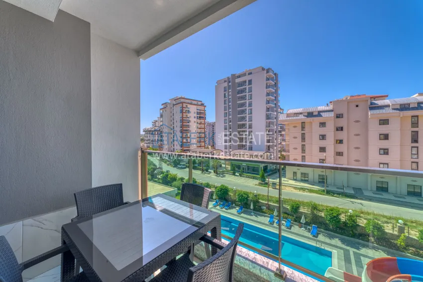 Purchase  Turnkey two-bedroom apartment in Mahmutlar in a modern complex 23 