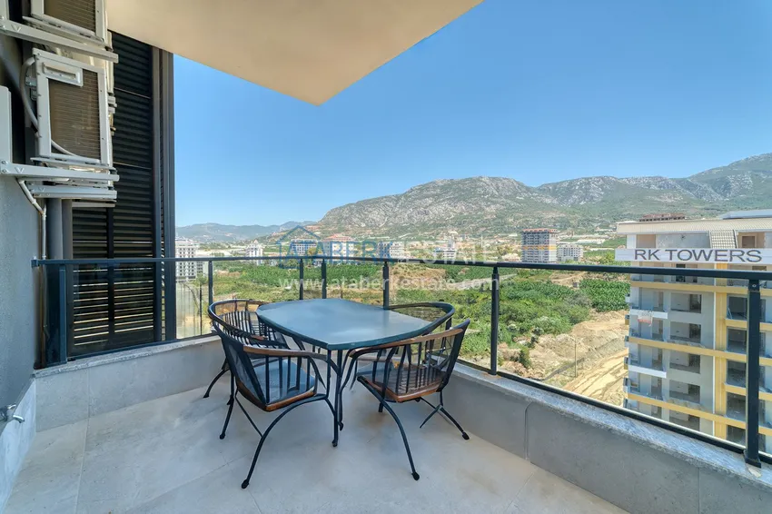 Purchase  An apartment with a designer interior and a separate kitchen in the center of Mahmutlar - Saturday Market District 25 