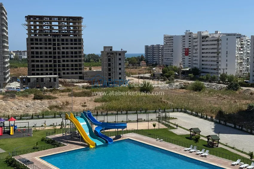 Finished two-bedroom apartment in Mersin, Tomyuk 2 