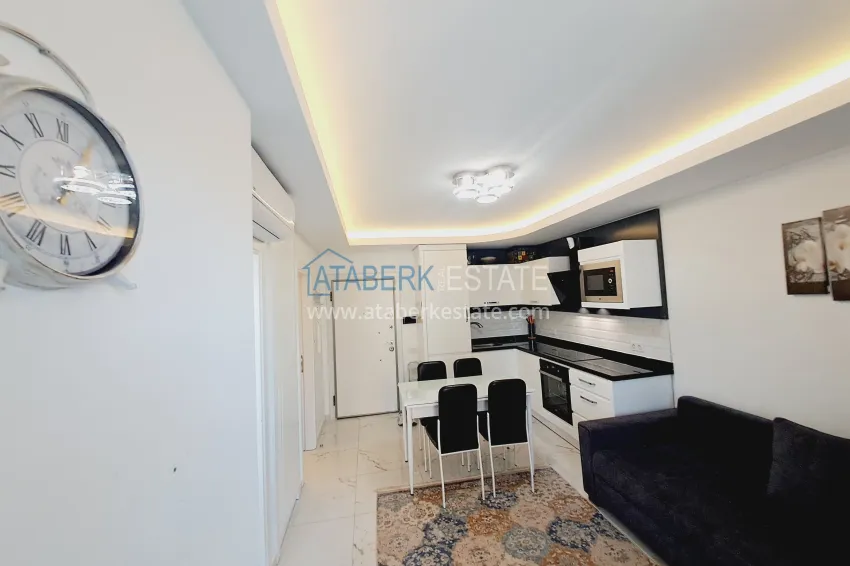 Purchase One bedroom apartment in the center of Alanya with furniture and access to a private beach 2