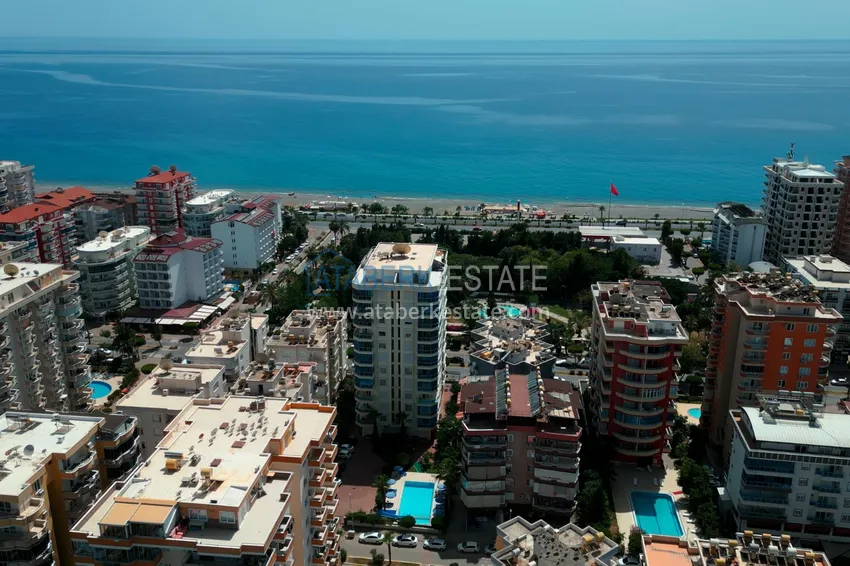 Apartment in Mahmutlar partially furnished with a glazed balcony and sea view 2 