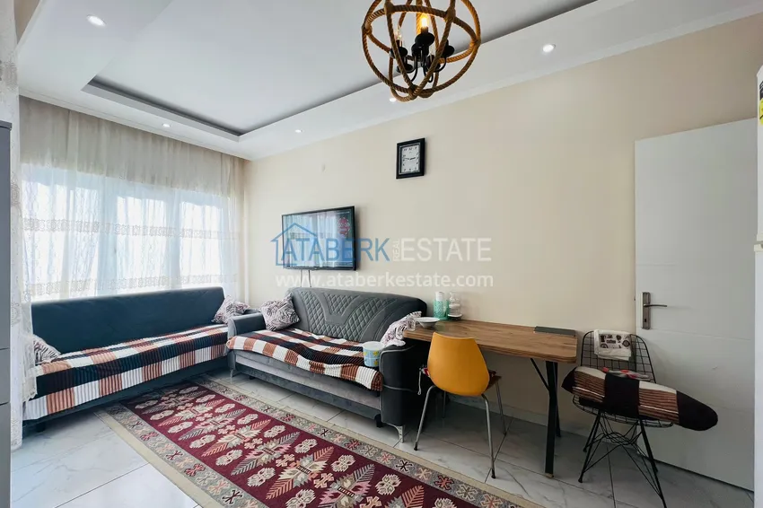 Purchase  One bedroom apartment in the center of Alanya, furnished. Suitable for a residence permit 3 
