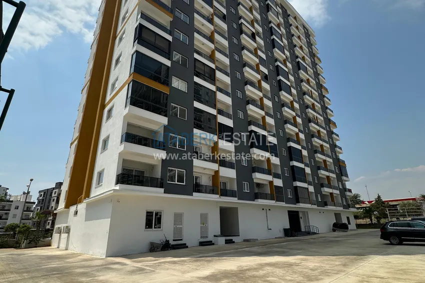 One bedroom apartment with new furniture, separate kitchen and 2 balconies in Mersin, Tomyuk 5