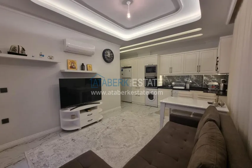 Purchase  Furnished three-room apartment in a prestigious area of Alanya, Oba 4 